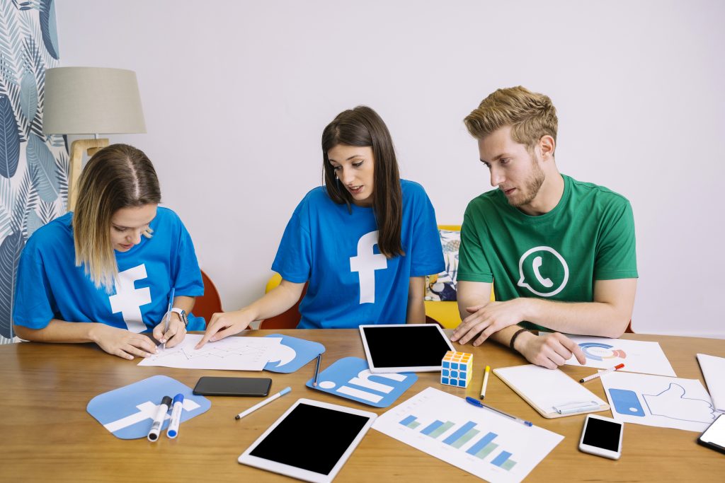 social-media-team-discussing-plan-workplace